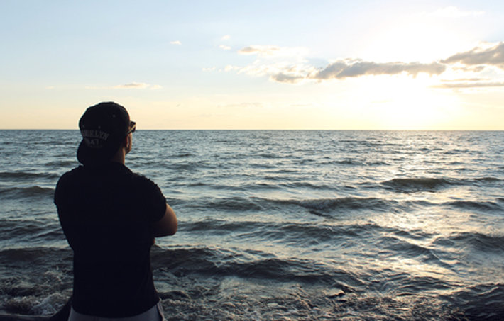 Man looking at the sea.